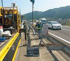 Photograph of accident recovery (guardrail)