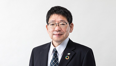 รูปถ่ายของโทรุ โยชิมิเนะ ผู้อำนวยการและกรรมการผู้จัดการ ผู้จัดการทั่วไปฝ่ายเทคโนโลยี
