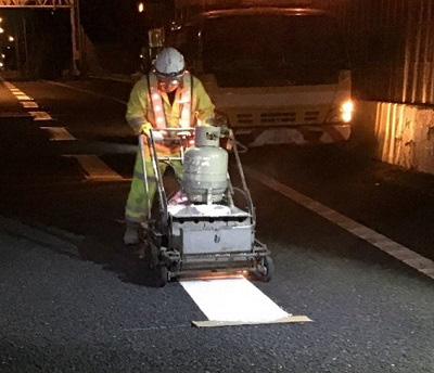 Photograph of road marking work work situation