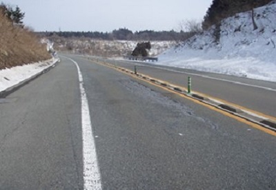 【路面損傷状況】の写真