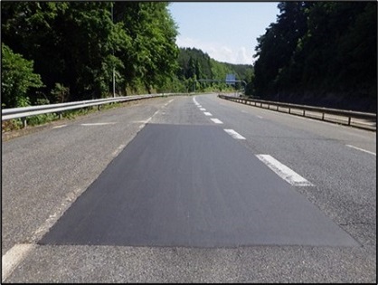 Photograph of pavement repair work after construction (image)