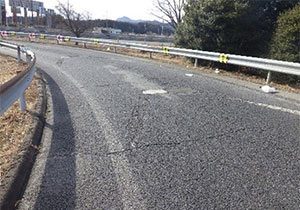 Utsunomiya IC exit ramp photo of pavement damage