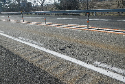 Photo 2 of the damaged road surface