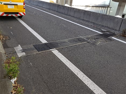 Photograph of damage to the expansion joint