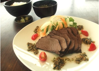 Image of boiled deer in black tea (with wasabi oil)