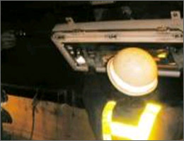 Photo of tunnel lighting equipment cleaning and inspection