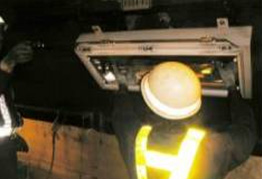 Image of cleaning and inspection of tunnel lighting equipment
