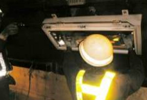 Image of cleaning and inspection of tunnel lighting equipment