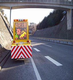 A photo of warning of a rear-end collision at the end of a traffic jam