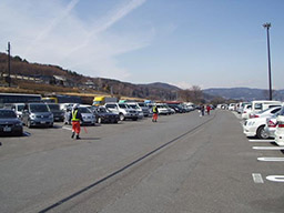 Photograph of arrangement of parking lot rearranging staff at rest facilities