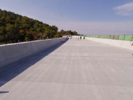 Photograph of completion of construction of new concrete slab