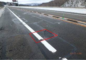 Photograph 2 of the place where cracks on the pavement surface, potholes, etc. occur