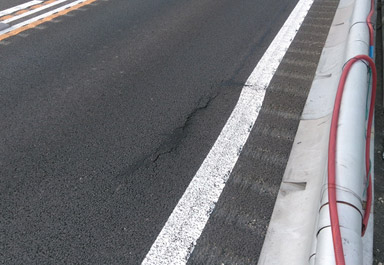 Image 2 of road surface damage