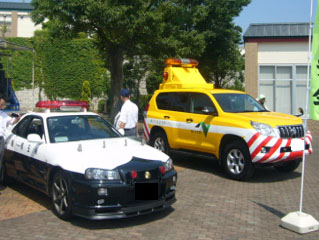 Pictures of exhibits such as patrol cars